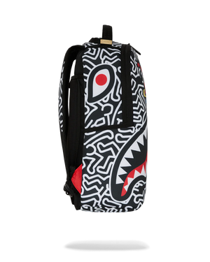 SPRAYGROUND 910B6914NSZ-KEITH HARING SKATER SHARK DLXSR BACKPACK Designers Closet