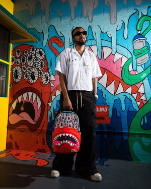 SPRAYGROUND 910B6926NSZ-JORGE RODRIGUEZ THE ARTIST COLLAB BLINKY SHARK BACKPACK Designers Closet