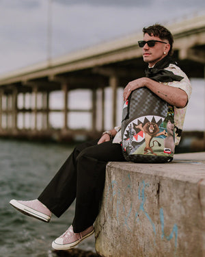 SPRAYGROUND 910B7790NSZ-1 MADAGASCAR ESCAPE TO THE CITY BACKPACK MADAGASCAR NYC Reveal